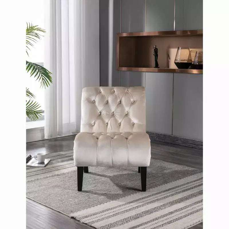 Fauteuil d'appoint sans accoudoirs en velours, avec boutons en tissu et pieds en bois