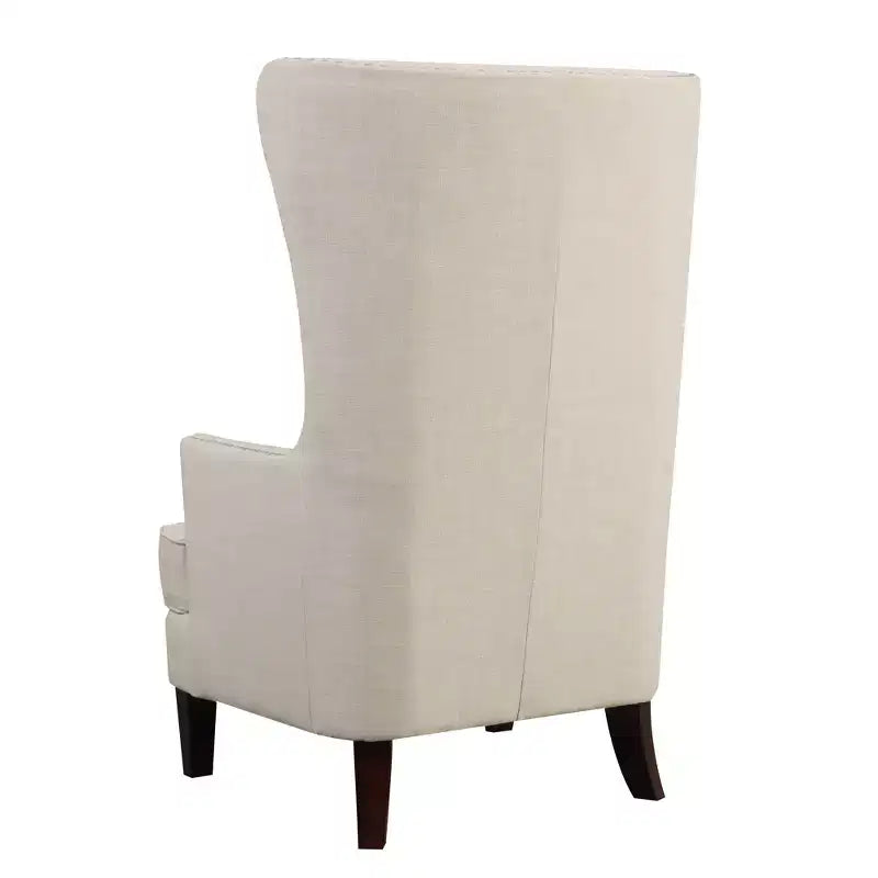 Chaise rembourrée à dossier haut