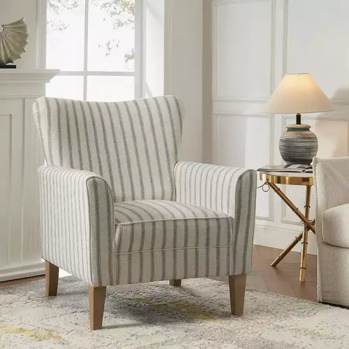 Fauteuil avec accoudoirs spéciaux